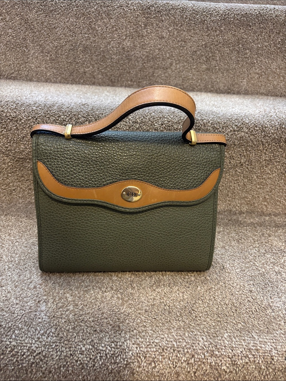 This authentic vintage Christian Dior Kelly-style top handle bag